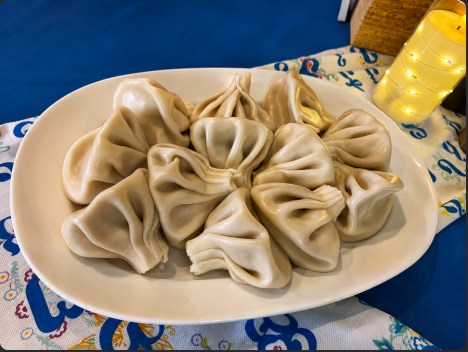 Khinkali — Georgian soup dumplings, hand-pleated with a twisted knot on top