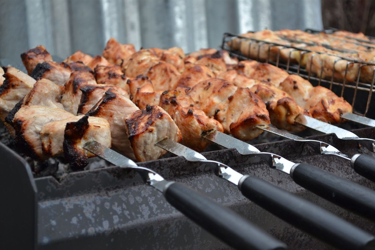 Mtsvadi — Georgian charcoal-grilled meat on flat skewers
